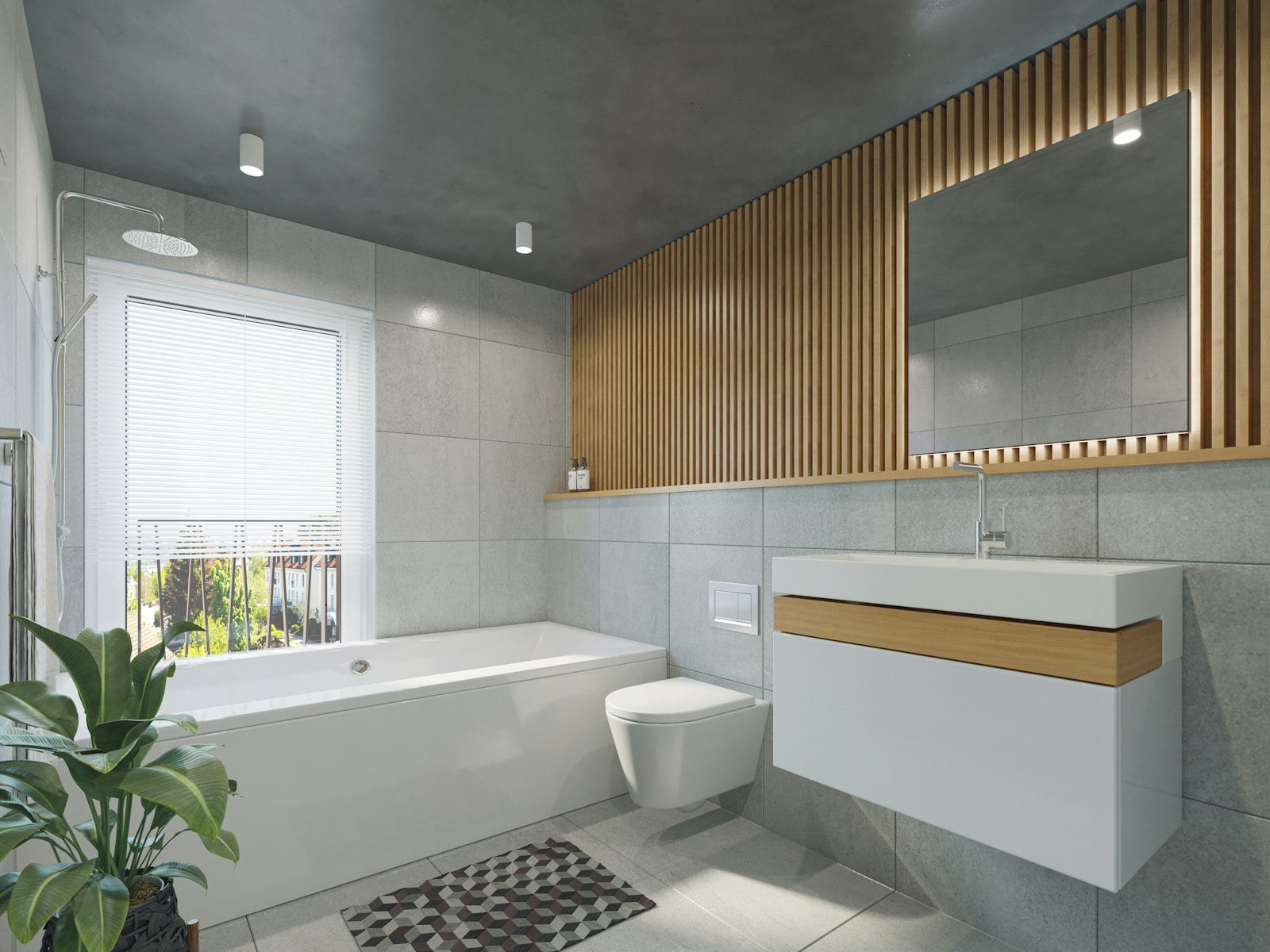 Modern bathroom with bathtub, wall-hung toilet and vanity